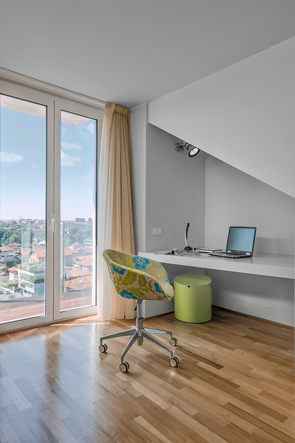 desk-and-armchair-near-to-french-window-in-the-chi-2UEQBRY.jpg